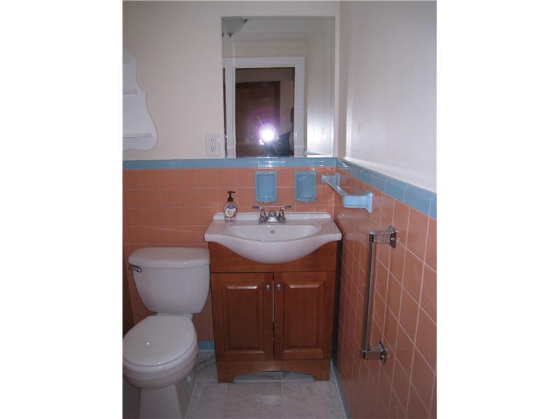 1507 Homestead Road Penn Hills, PA 15147 - Photo 8 of 17 Partial Bath. Just to the left of the front entry is the first floor powder room.