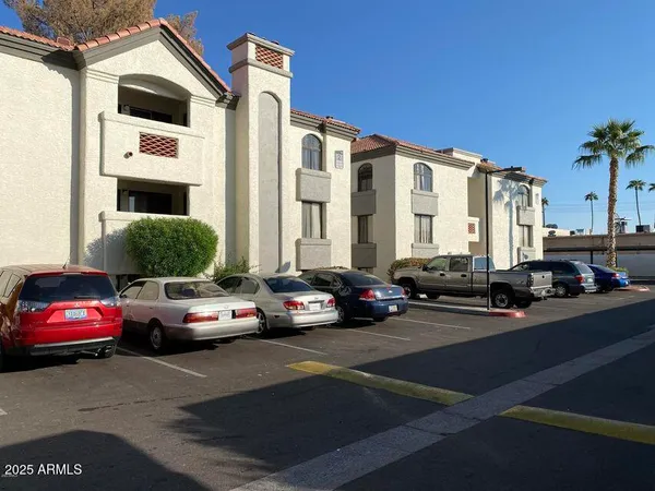 a view of a street with cars