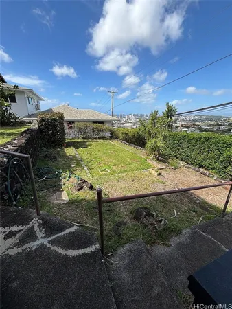 a view of a lake with a yard