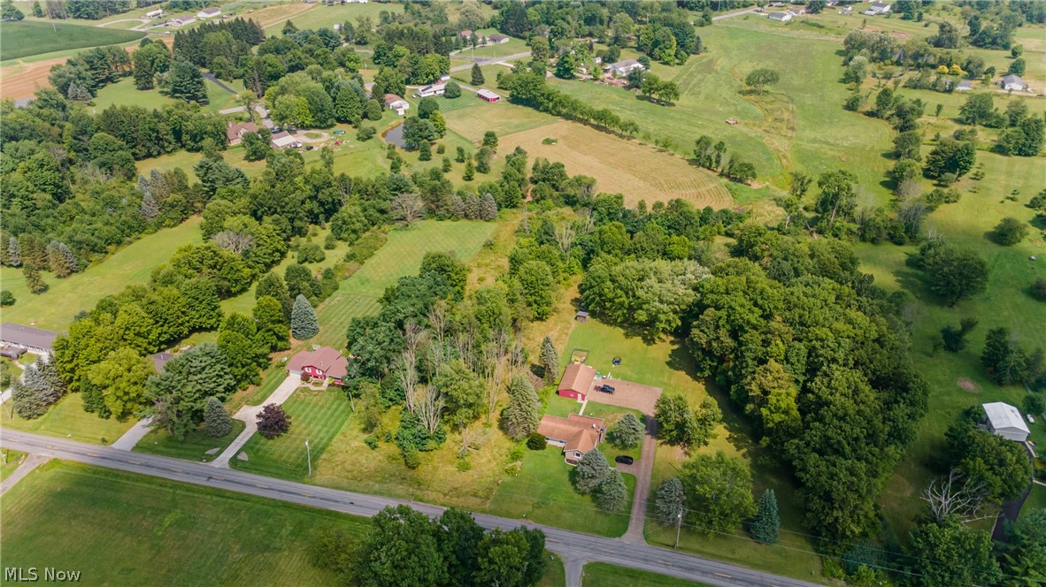 Stanley Road Garrettsville, OH 44231 - Photo 16 of 17 Expansive aerial property showcasing a verdant landscape with mature trees, established homes, and manicured lawns
