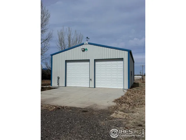 a front view of a house with a garage