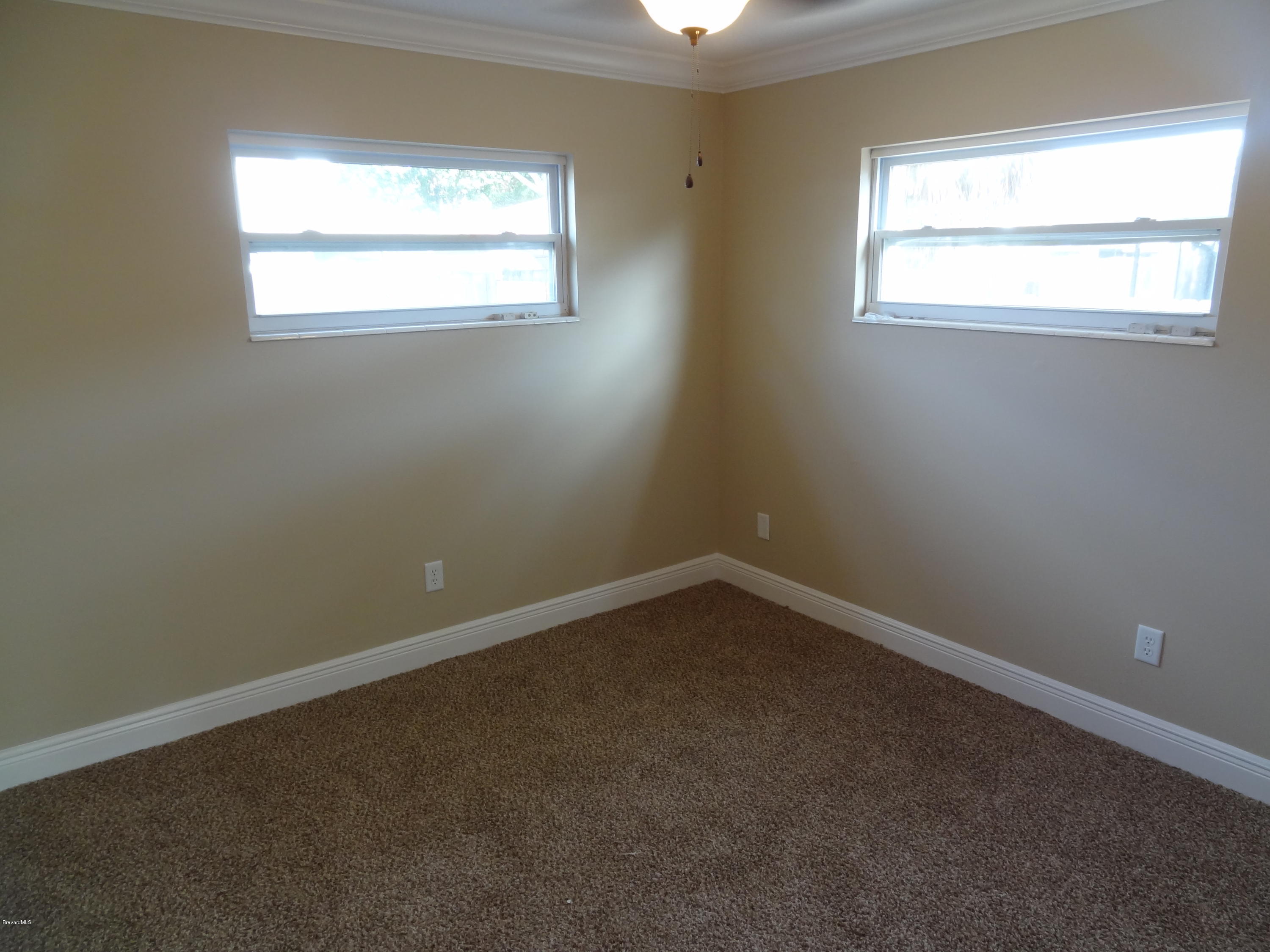 944 Kings Post Road Rockledge, FL 32955 - Photo 17 of 26 Bedroom 2