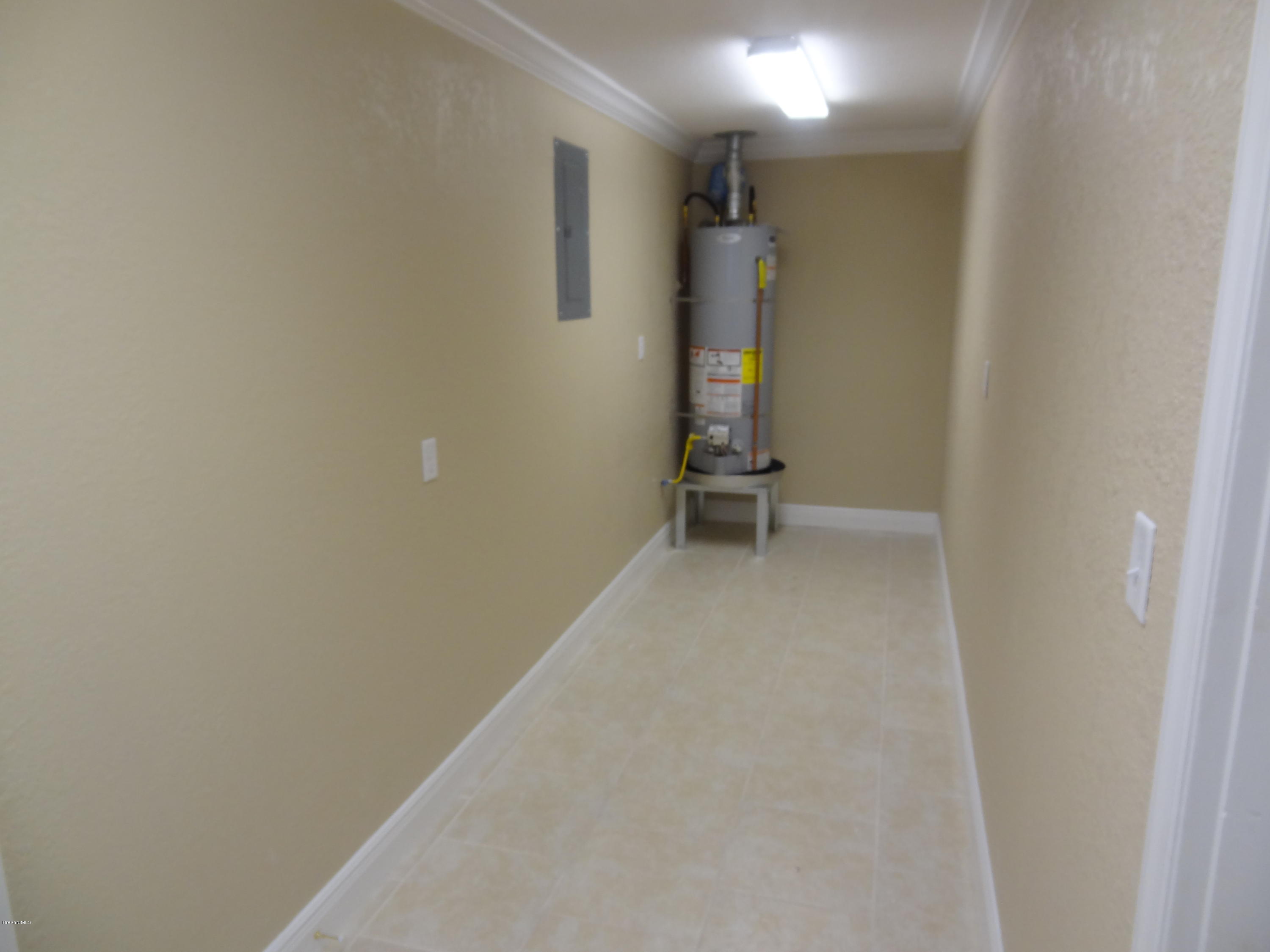 944 Kings Post Road Rockledge, FL 32955 - Photo 21 of 26 HUGE laundry room