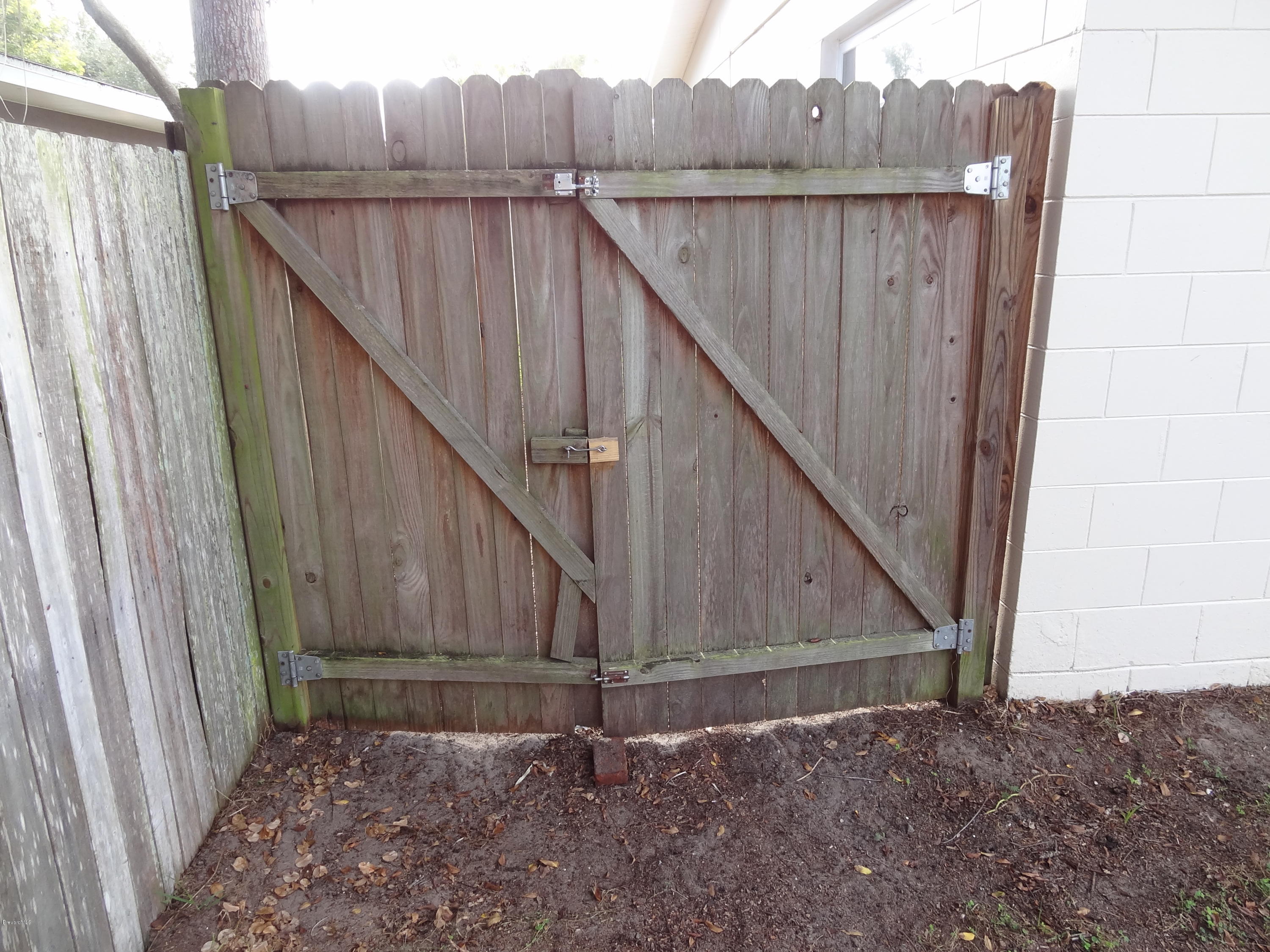 944 Kings Post Road Rockledge, FL 32955 - Photo 26 of 26 Privacy Fence around back yard