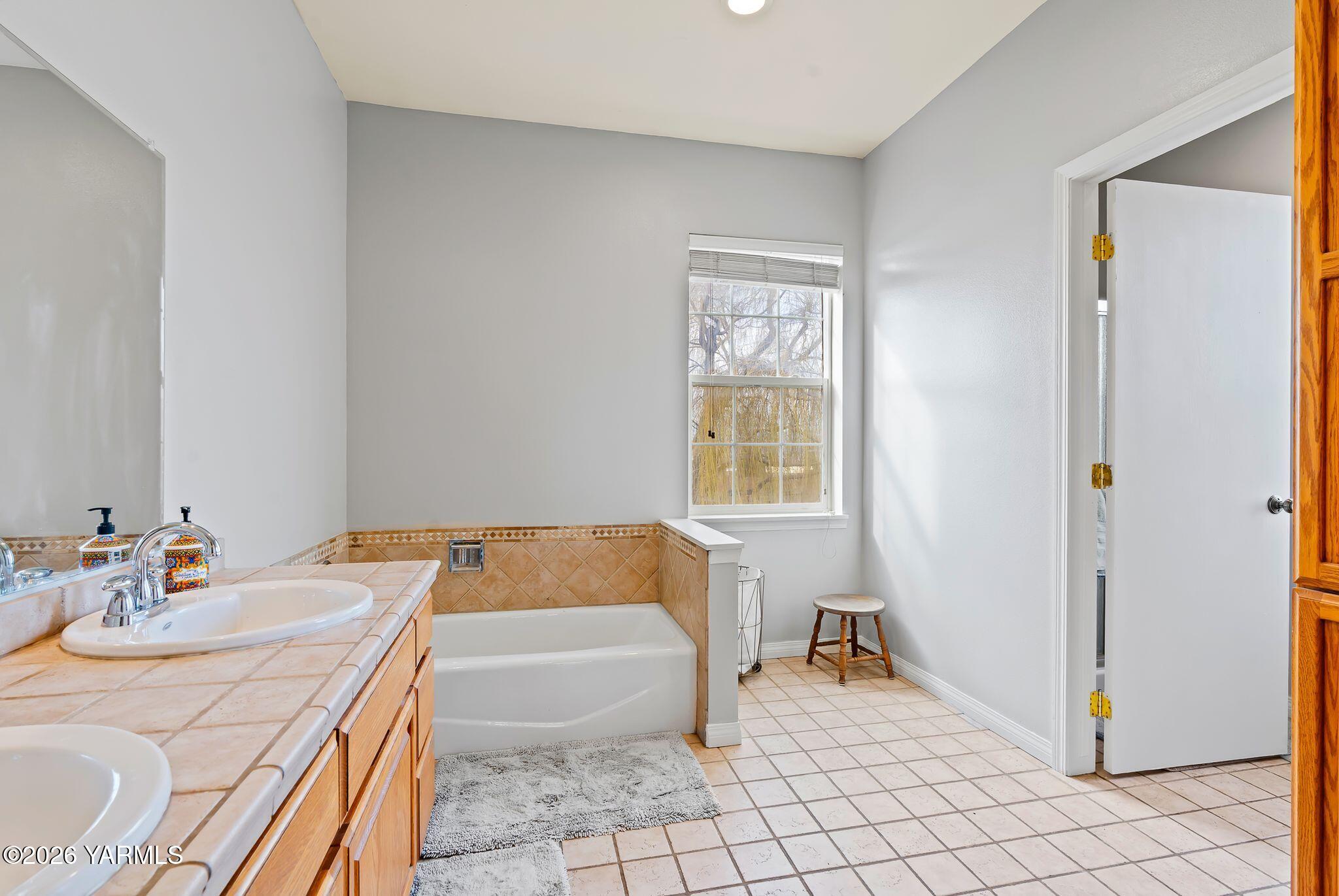 321 Gangl Road Wapato, WA 98951 - Photo 47 of 54 a bathroom with a sink and a mirror
