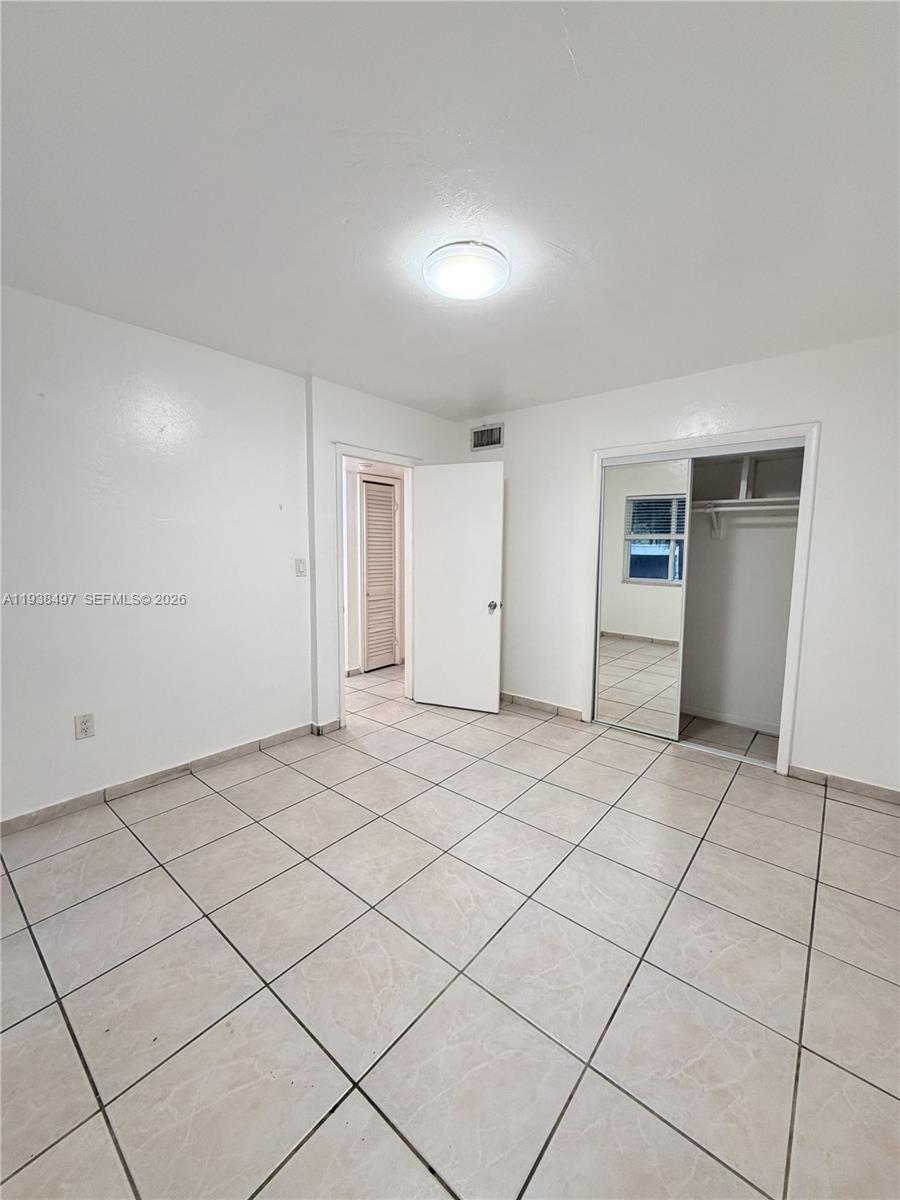 1860 Southwest 22nd Street, Unit 7 Miami, FL 33145 - Photo 4 of 8 a view of empty room