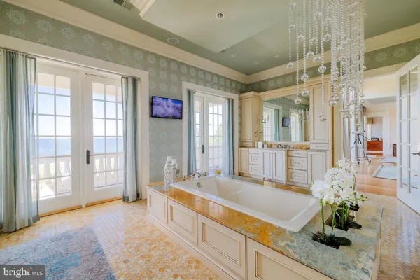 a kitchen with stainless steel appliances granite countertop a lot of storage and utility