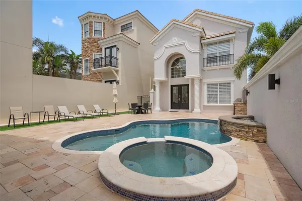 a view of outdoor space yard swimming pool and porch
