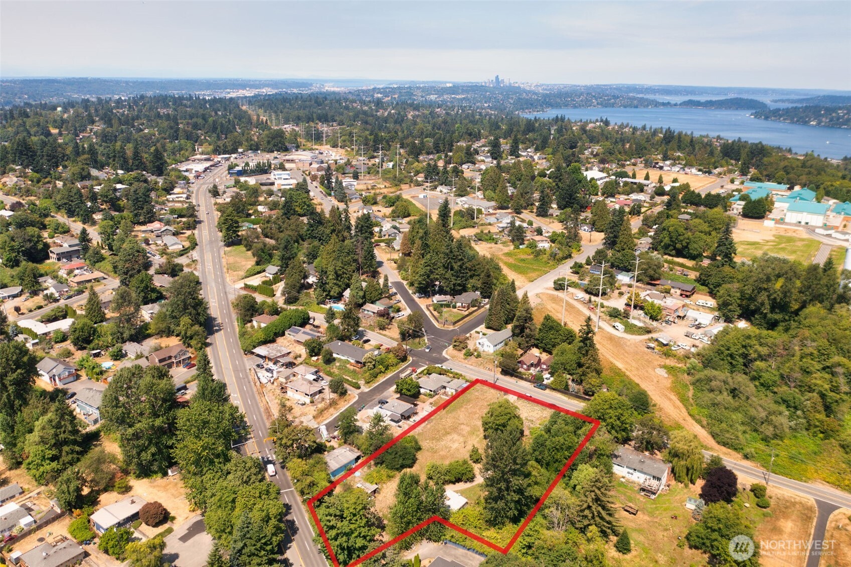 8011 South 128th Street Seattle, WA 98178 - Photo 12 of 15 an aerial view of residential houses with city view