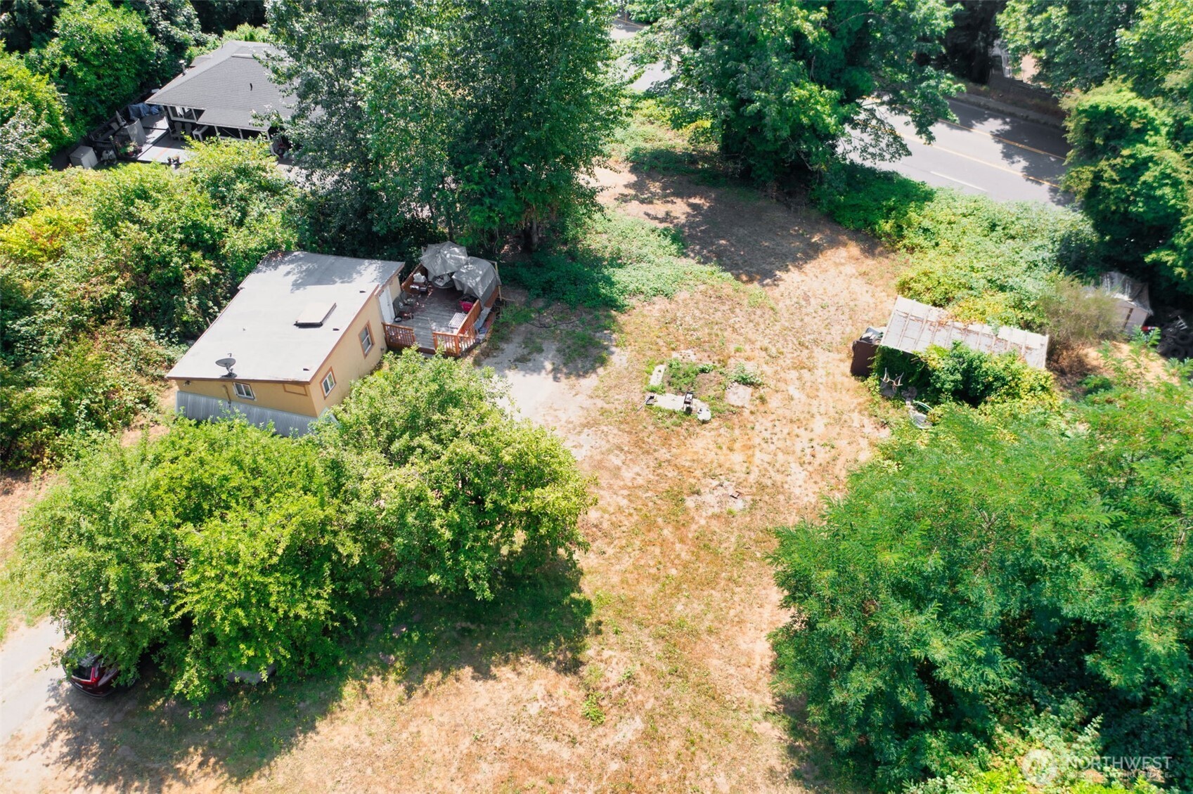 8011 South 128th Street Seattle, WA 98178 - Photo 14 of 15 an aerial view of a house with a yard