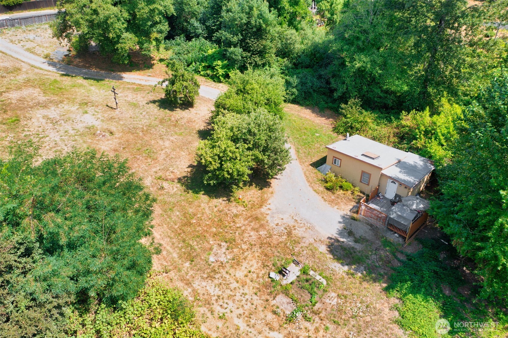 8011 South 128th Street Seattle, WA 98178 - Photo 15 of 15 an aerial view of a house with a yard