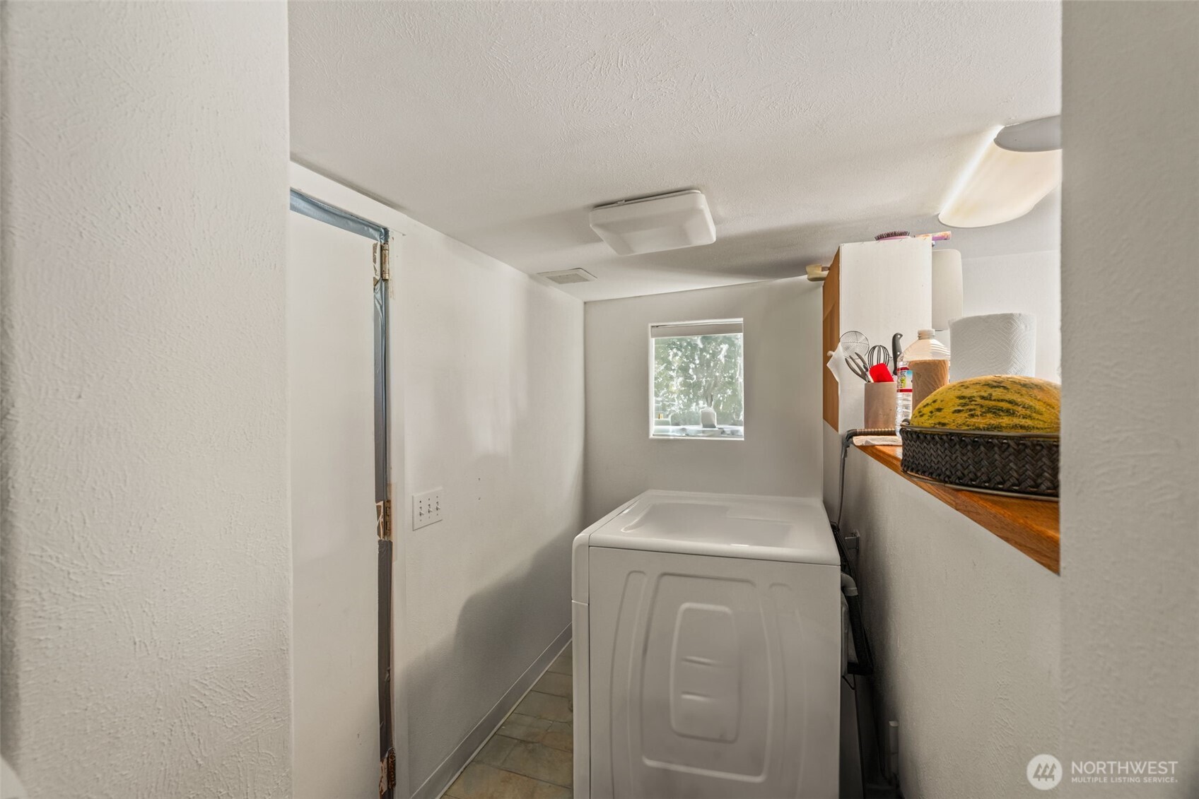 8011 South 128th Street Seattle, WA 98178 - Photo 7 of 15 a utility room with dryer and washer