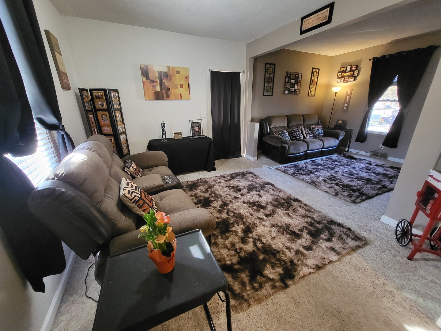 1204 North Center Street Joliet, IL 60435 - Photo 2 of 13 a living room with furniture and wooden floor