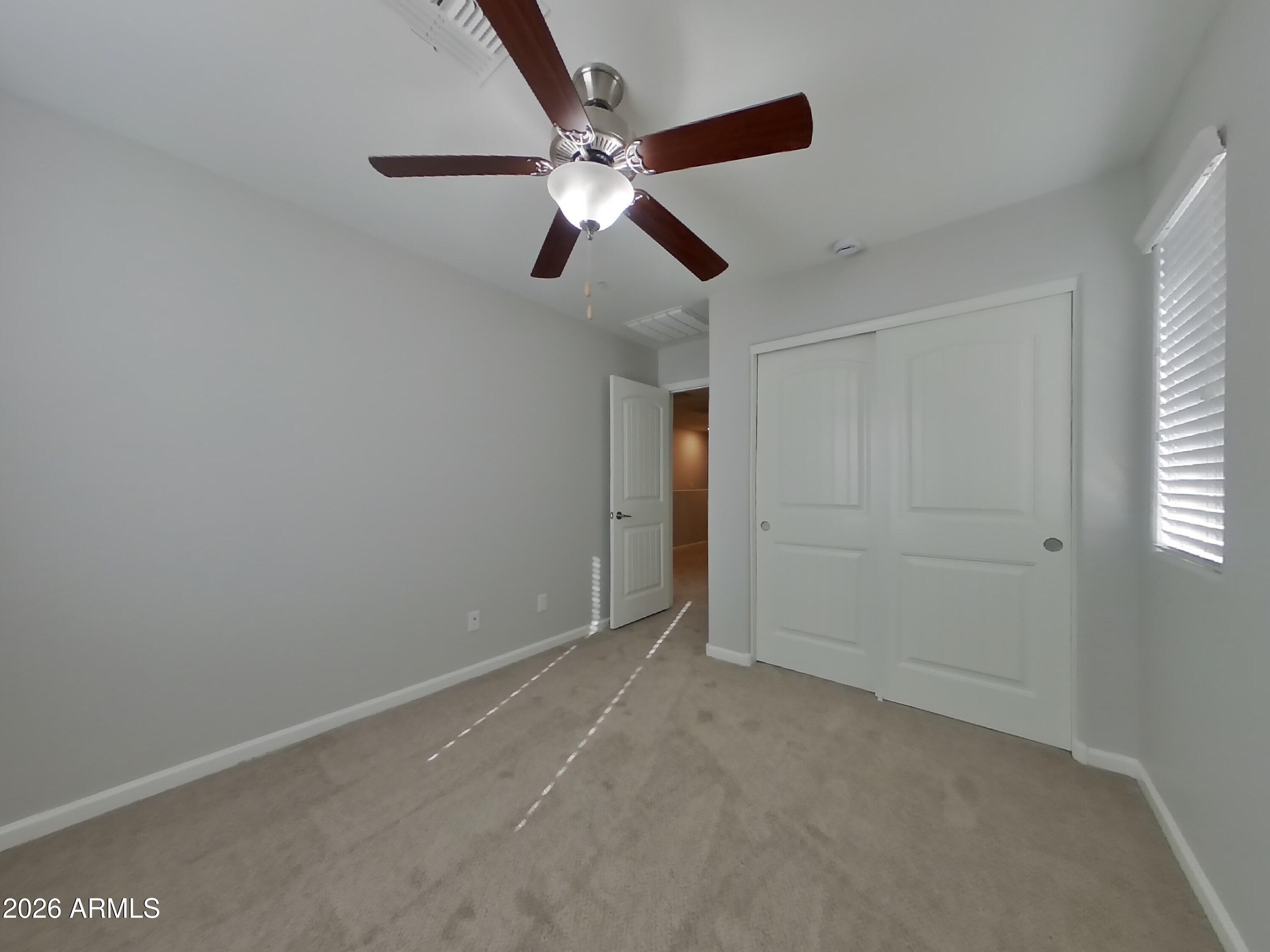 12577 West Steed Ridge Peoria, AZ 85383 - Photo 10 of 17 a view of an empty room