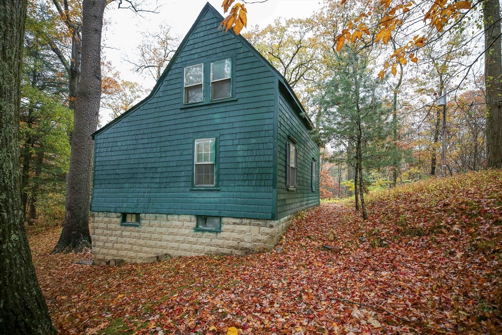 450 Mt Wayte Avenue Framingham, MA 01702 - Photo 5 of 28 a view of a house with a yard