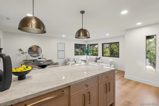 a kitchen with sink and window