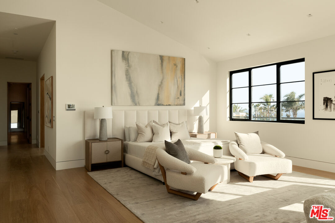 5819 Filaree Heights Road Malibu, CA 90265 - Photo 18 of 41 a living room with furniture and a large window