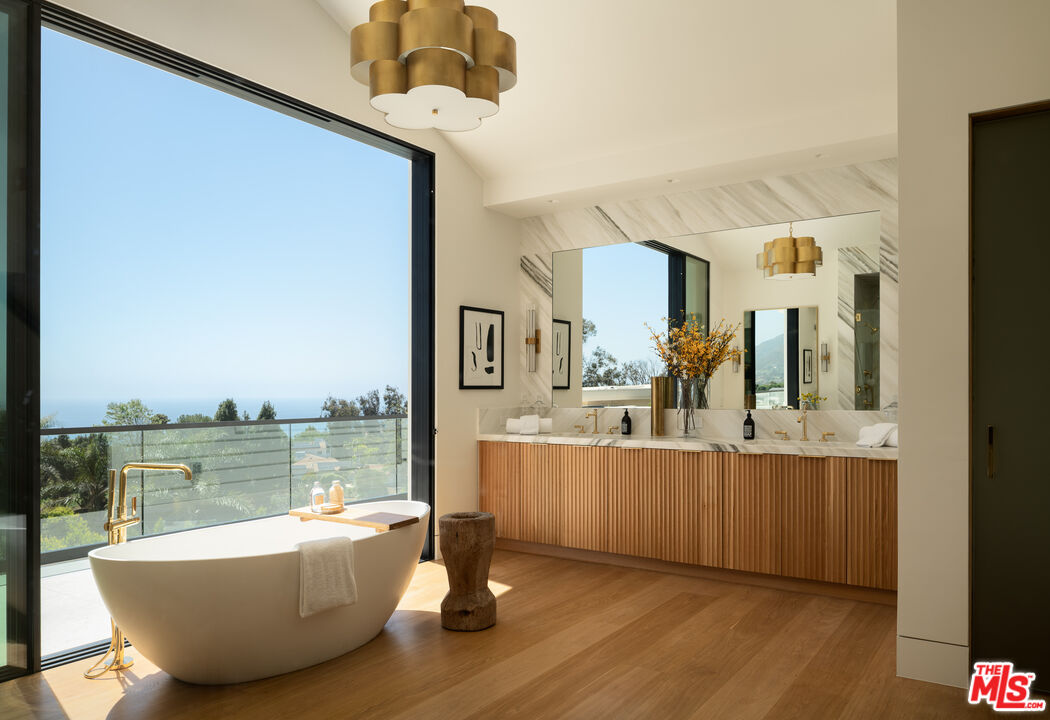 5819 Filaree Heights Road Malibu, CA 90265 - Photo 21 of 41 a living room with stainless steel appliances kitchen island granite countertop a sink and cabinets
