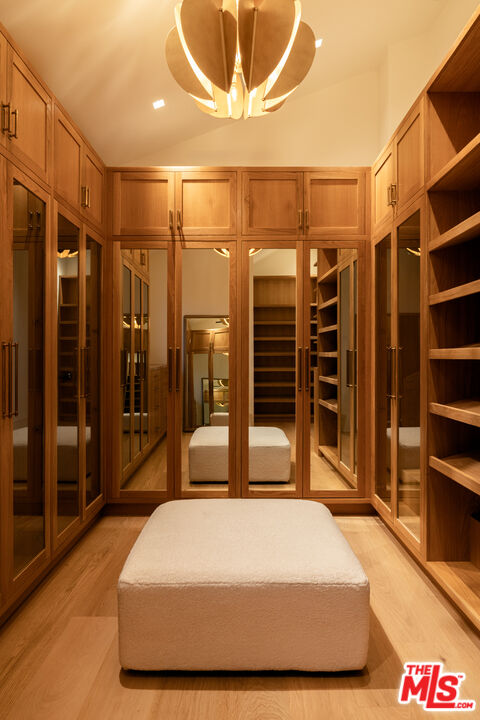 5819 Filaree Heights Road Malibu, CA 90265 - Photo 23 of 41 a bedroom with a bed and closet