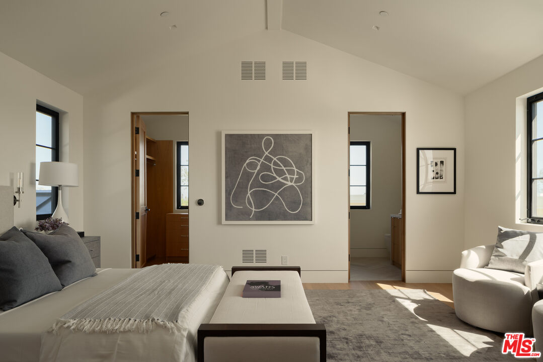 5819 Filaree Heights Road Malibu, CA 90265 - Photo 25 of 41 a bedroom with a bed and a couch