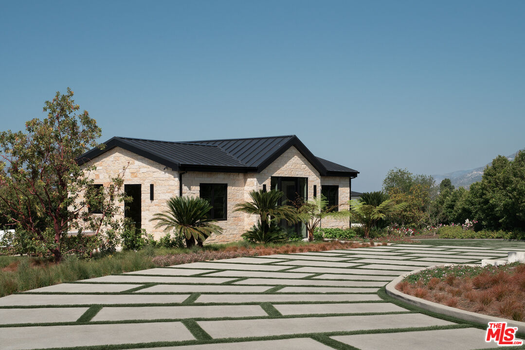 5819 Filaree Heights Road Malibu, CA 90265 - Photo 29 of 41 a front view of a house with a yard