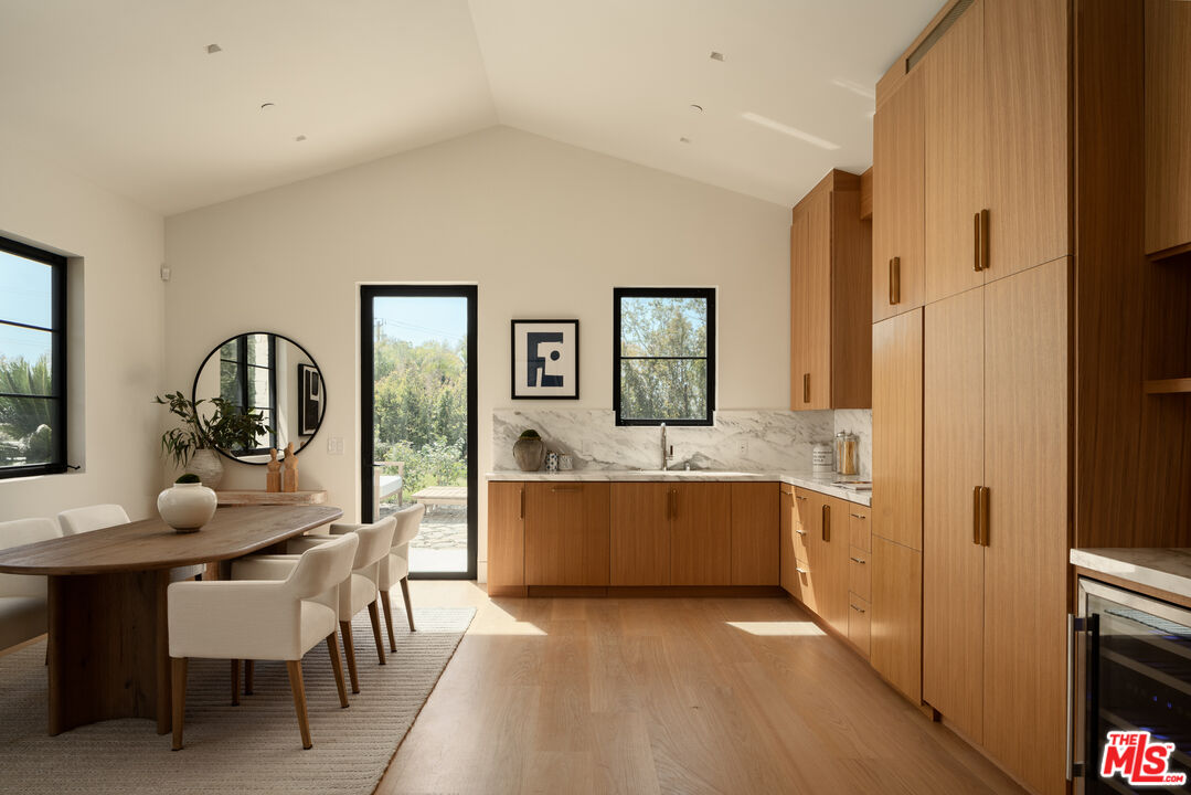 5819 Filaree Heights Road Malibu, CA 90265 - Photo 32 of 41 a dining room with furniture and window