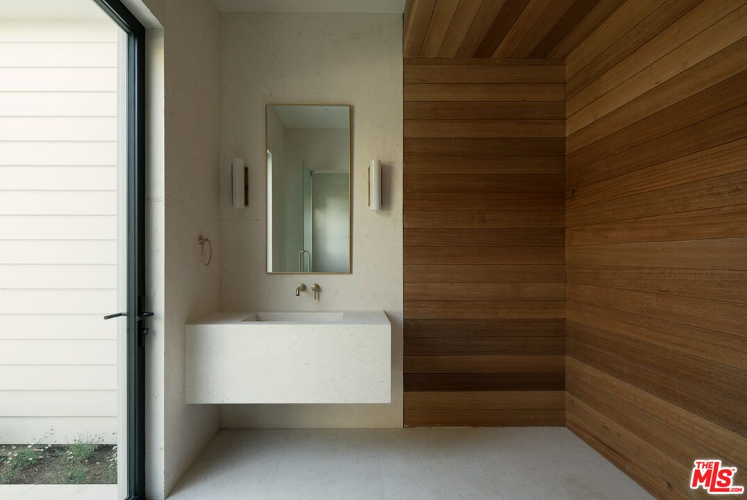 5819 Filaree Heights Road Malibu, CA 90265 - Photo 34 of 41 a bathroom with a bathtub and shower