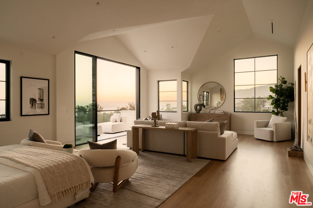 5819 Filaree Heights Road Malibu, CA 90265 - Photo 37 of 41 a living room with furniture and a large window