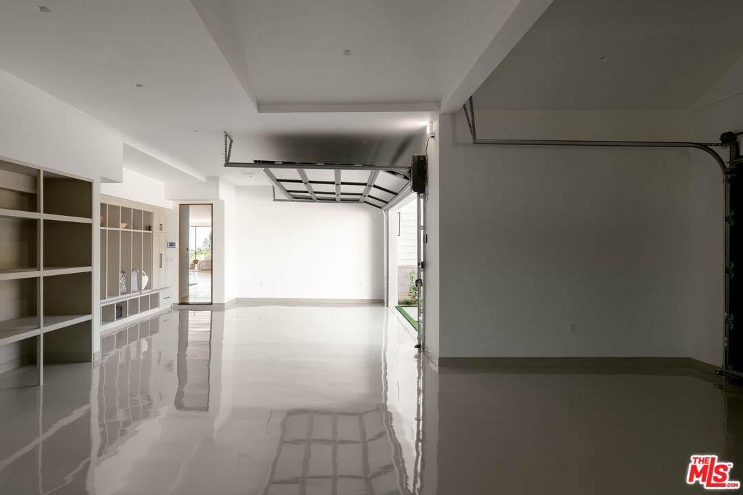 5819 Filaree Heights Road Malibu, CA 90265 - Photo 39 of 41 a view of storage and utility room with refrigerator and racks