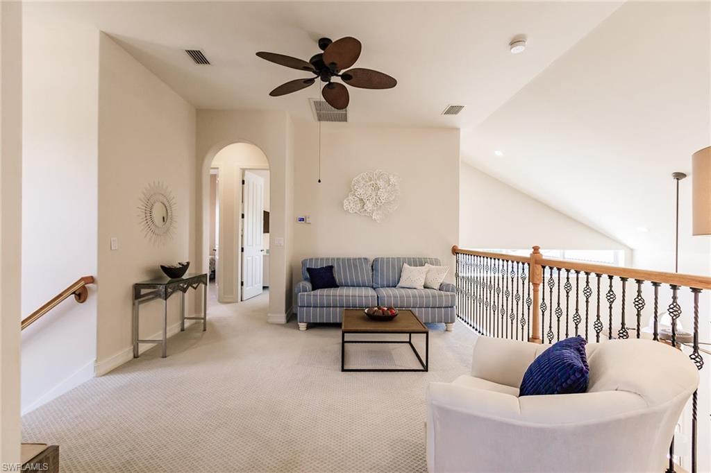 7797 Ashton Road Naples, FL 34113 - Photo 32 of 50 a living room with furniture