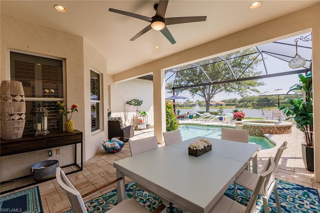 7797 Ashton Road Naples, FL 34113 - Photo 38 of 50 a view of a dining room with furniture window and outside view