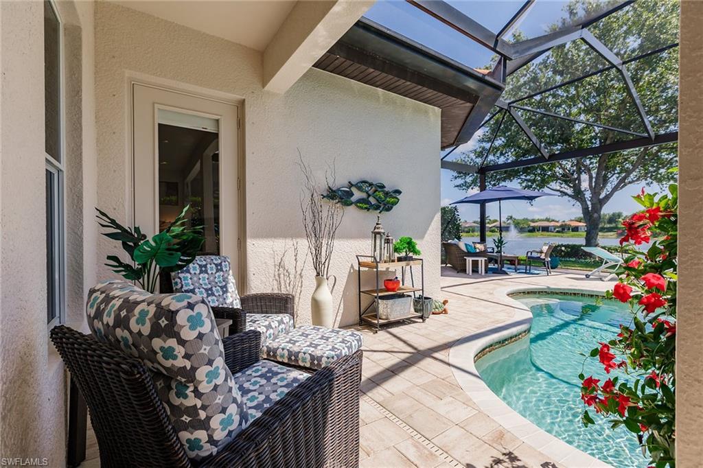 7797 Ashton Road Naples, FL 34113 - Photo 40 of 50 a view of outdoor dining space with a patio