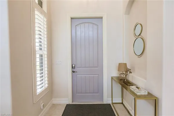 a view of an entryway with a door