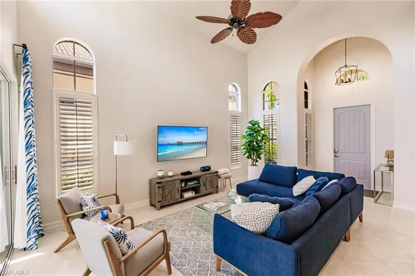 a living room with furniture and a window