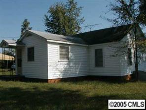 4502 Richardson Road Monroe, NC 28112 - Photo 6 of 7 a view of a house with a yard