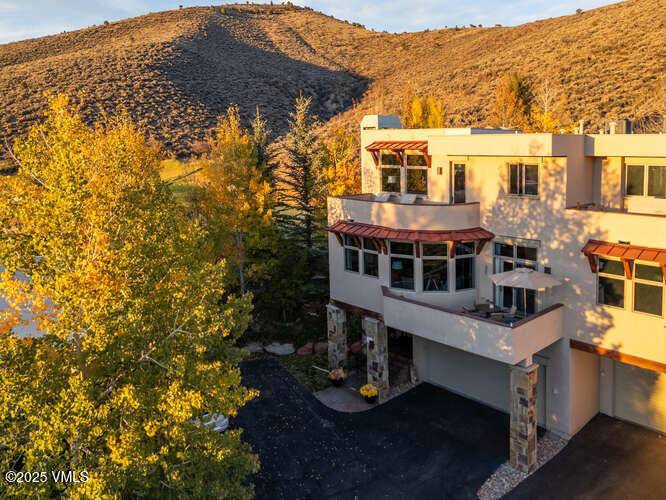 751 Singletree Road, Unit 28 Edwards, CO 81632 - Photo 13 of 20 an aerial view of a house with a yard