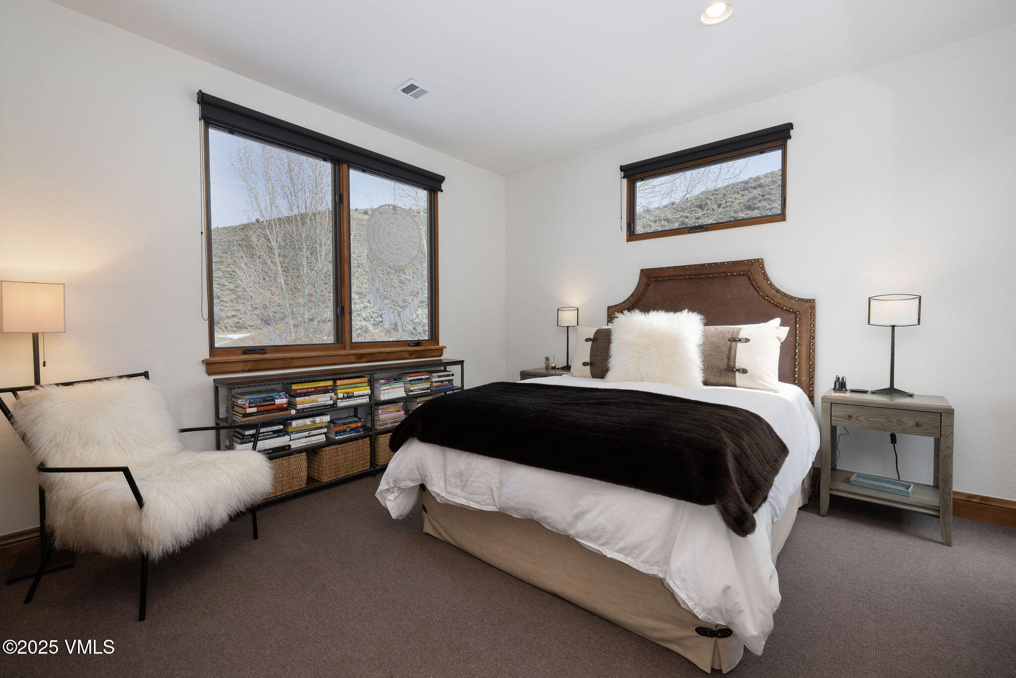 751 Singletree Road, Unit 28 Edwards, CO 81632 - Photo 10 of 20 a bedroom with a bed and a couch