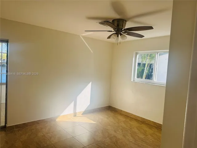 a view of house with outdoor space and swimming pool