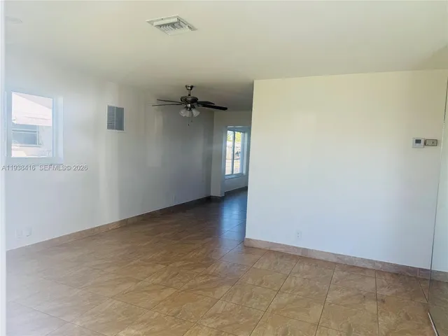 a view of a street with houses