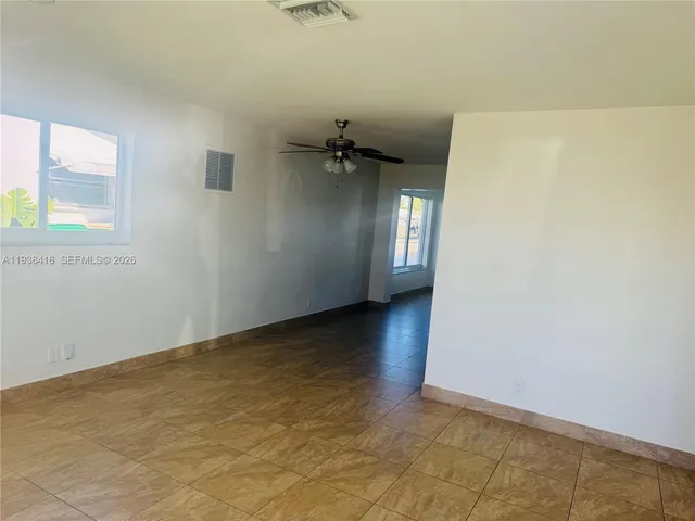 a house with garden in front of it