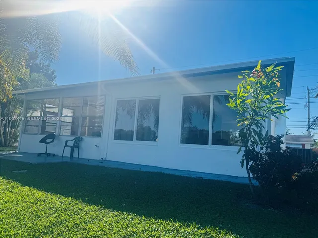 a view of a backyard with plants