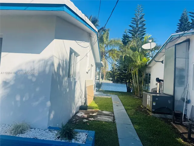 a view of swimming pool yard from a yard