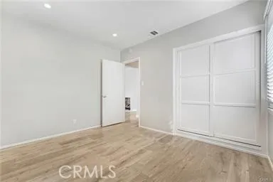 a bathroom with a bathtub sink vanity and mirror