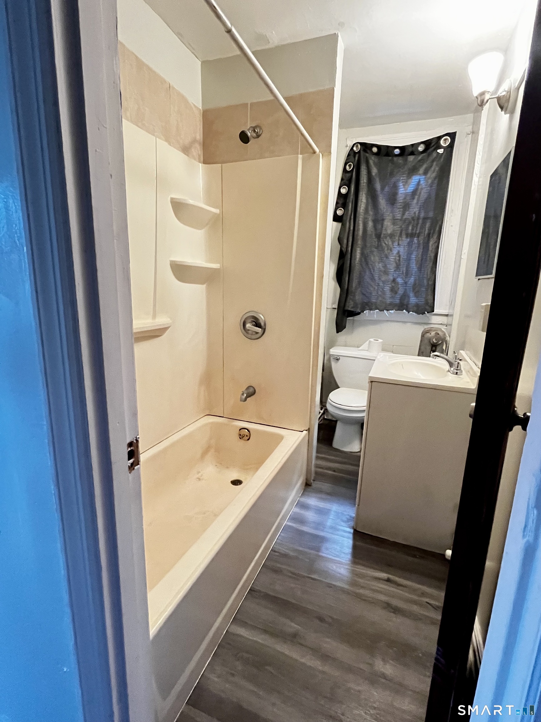 143 Putnam Street, Unit 2S Hartford, CT 06106 - Photo 5 of 9 a bathroom with a tub a sink and a shower