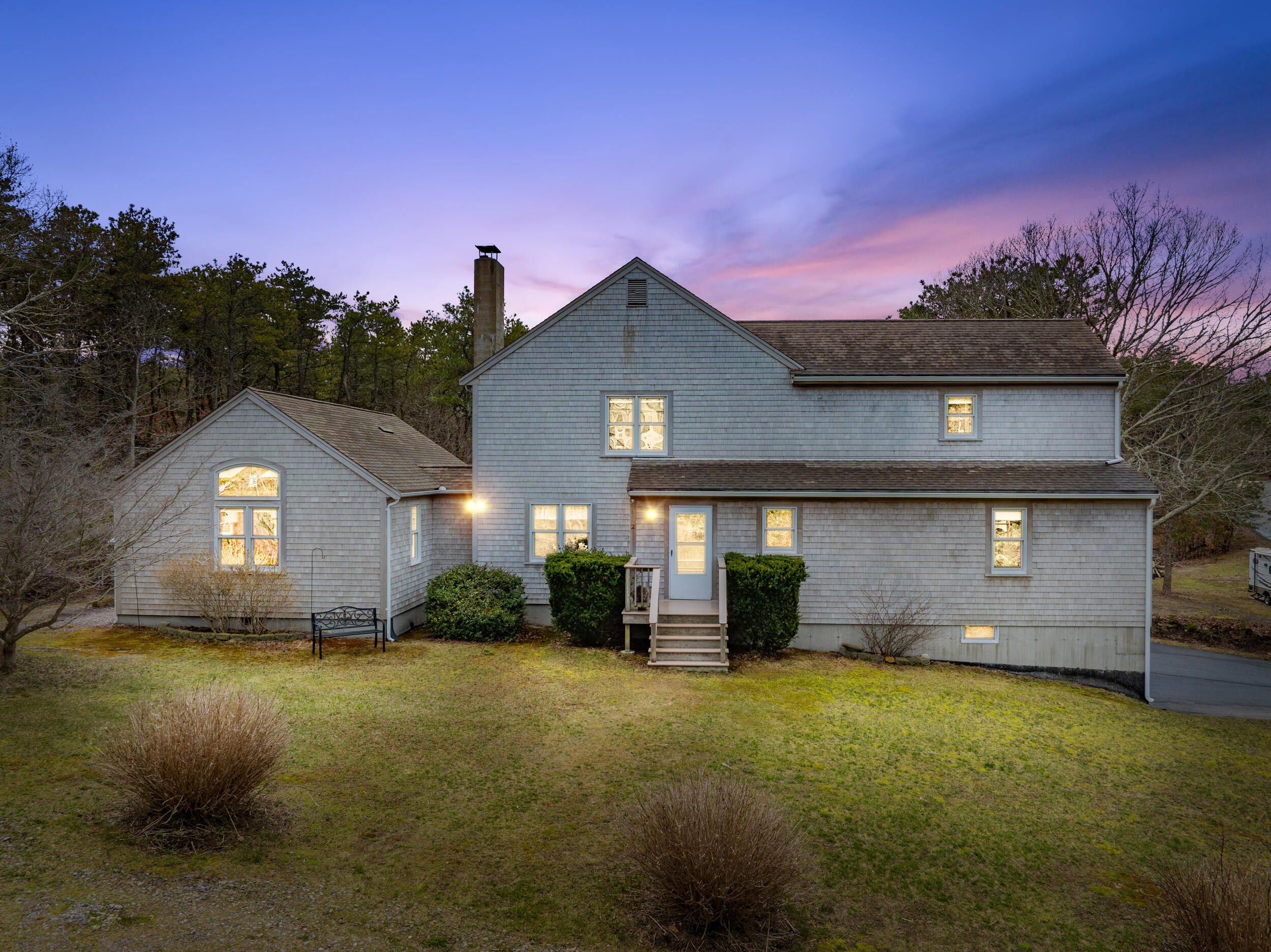2 Short Lots Lane Truro, MA 02666 - Photo 1 of 66 a front view of a house with a yard