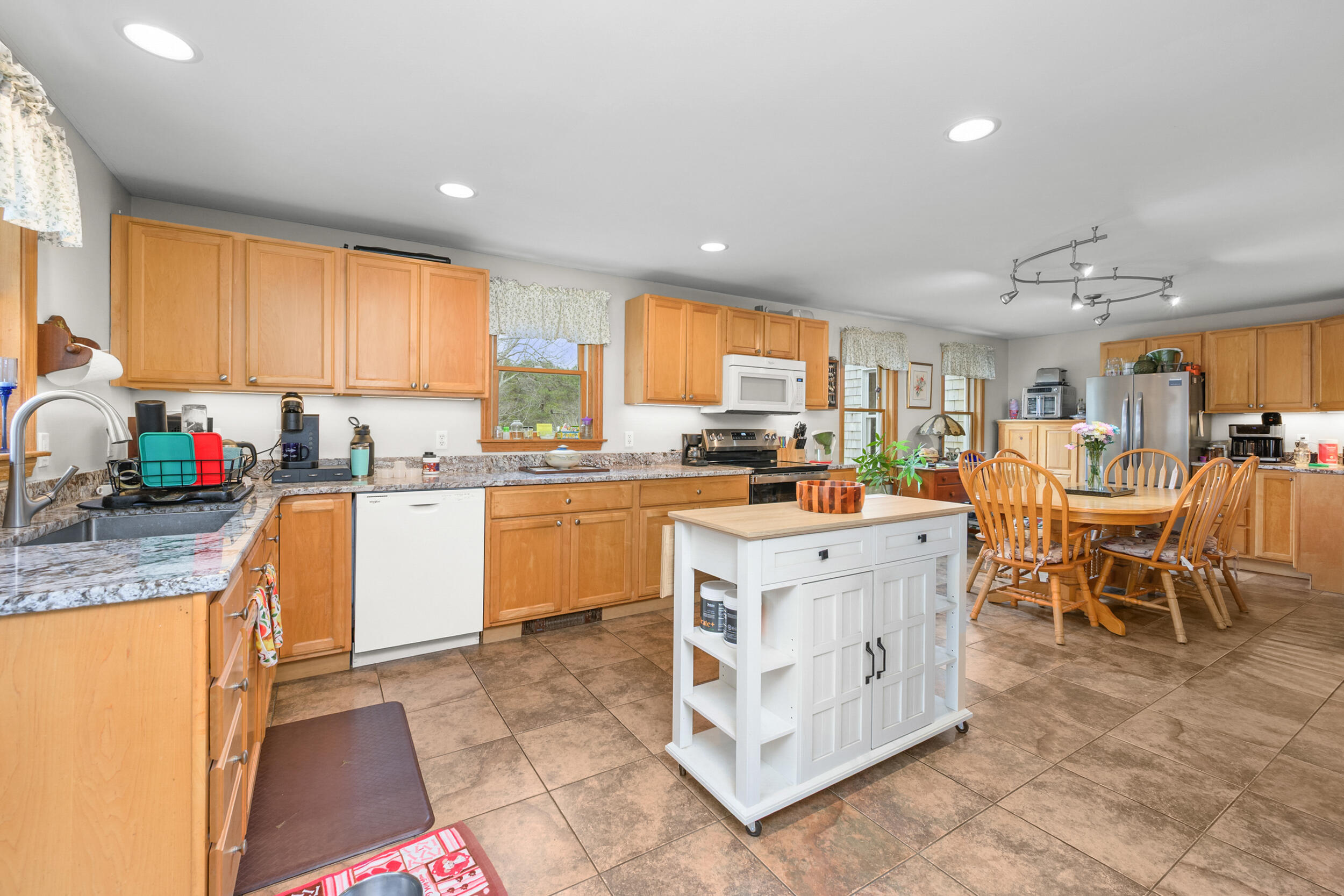 2 Short Lots Lane Truro, MA 02666 - Photo 12 of 66 a kitchen with appliances a sink a counter top space and living room view