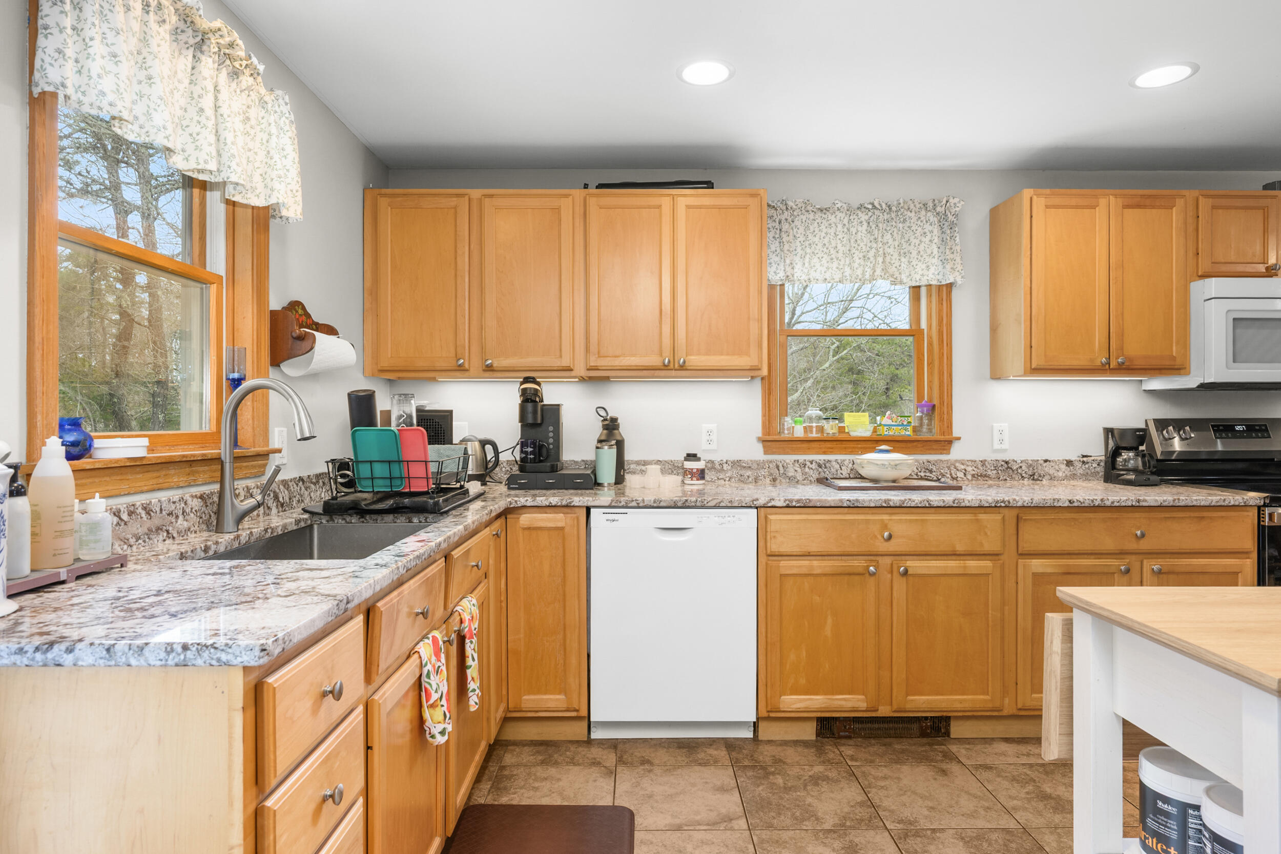 2 Short Lots Lane Truro, MA 02666 - Photo 13 of 66 a kitchen with granite countertop sink stove and cabinets