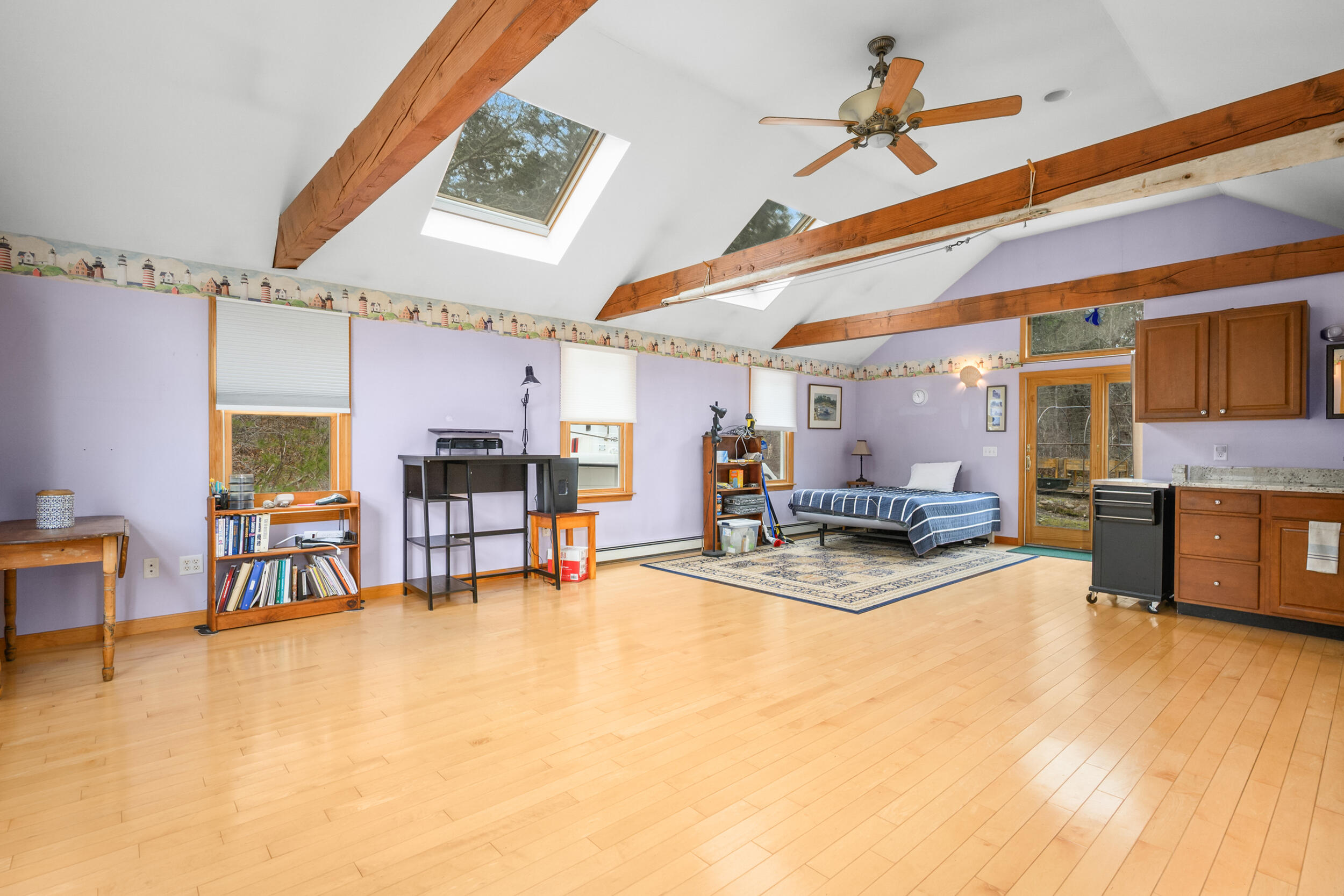 2 Short Lots Lane Truro, MA 02666 - Photo 18 of 66 a living room with furniture and a flat screen tv