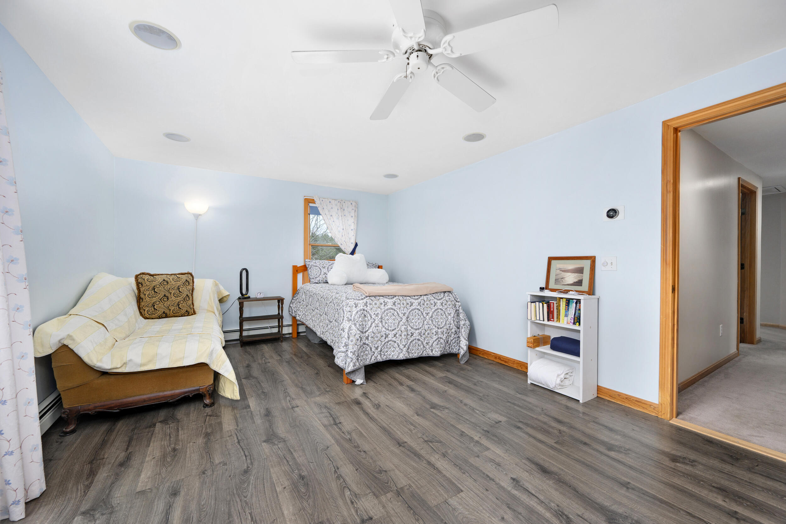 2 Short Lots Lane Truro, MA 02666 - Photo 34 of 66 a bedroom with furniture and wooden floor