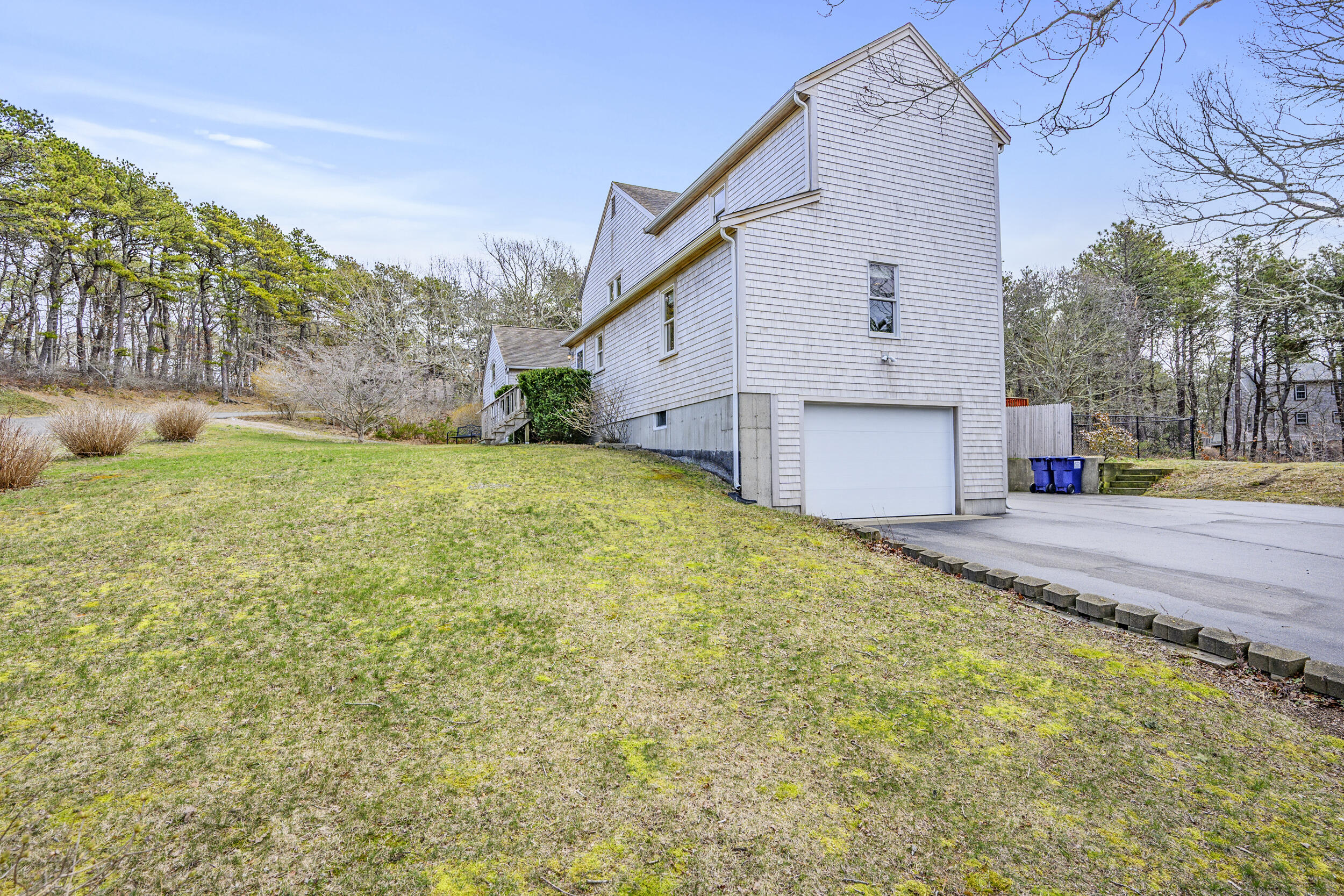 2 Short Lots Lane Truro, MA 02666 - Photo 39 of 66 a view of a backyard with large trees